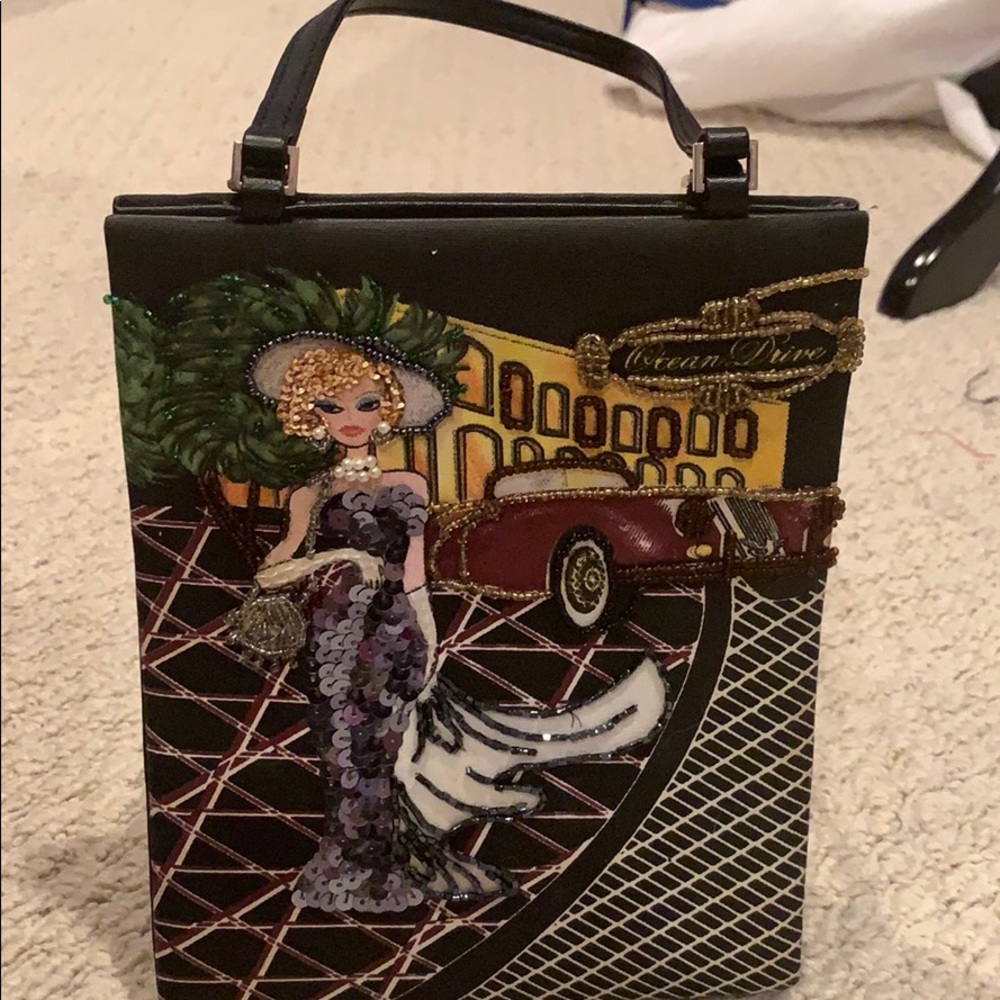 Black purse with beaded Ocean Drive scene